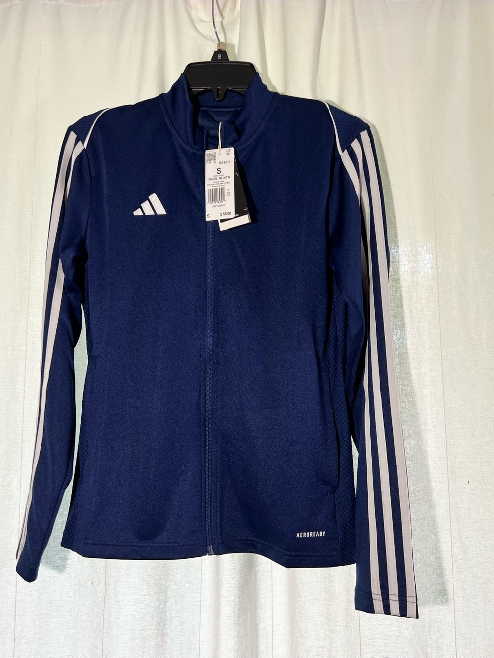 women's Adidas Tiro 23 League training jacket in team navy blue.